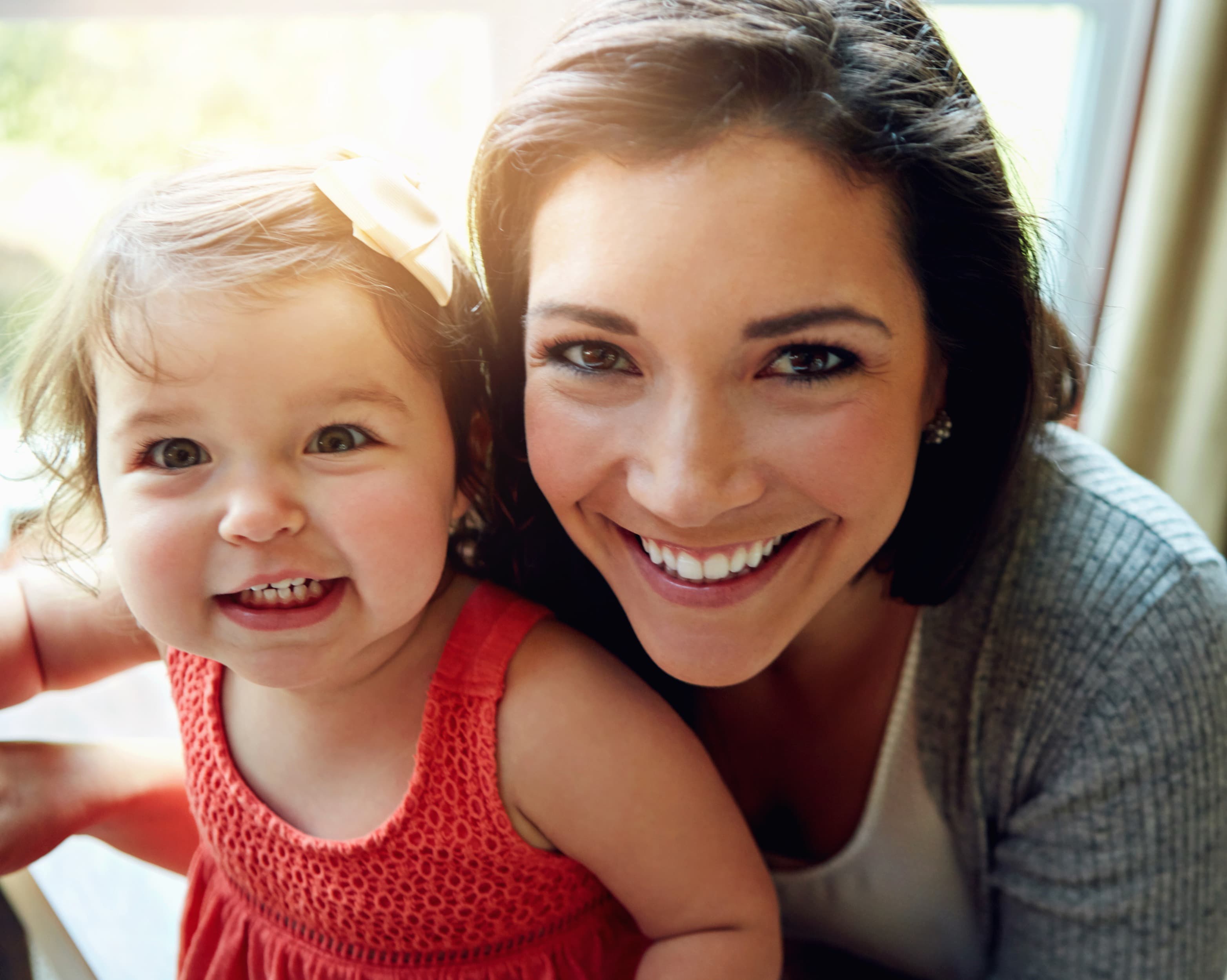 Mother and child — East River Dental